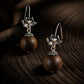Harmony & Blessings – Tibetan Silver Lotus Wood Bead Earrings