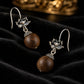 Harmony & Blessings – Tibetan Silver Lotus Wood Bead Earrings