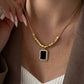 Strength & Radiance – Black CZ Halo Necklace