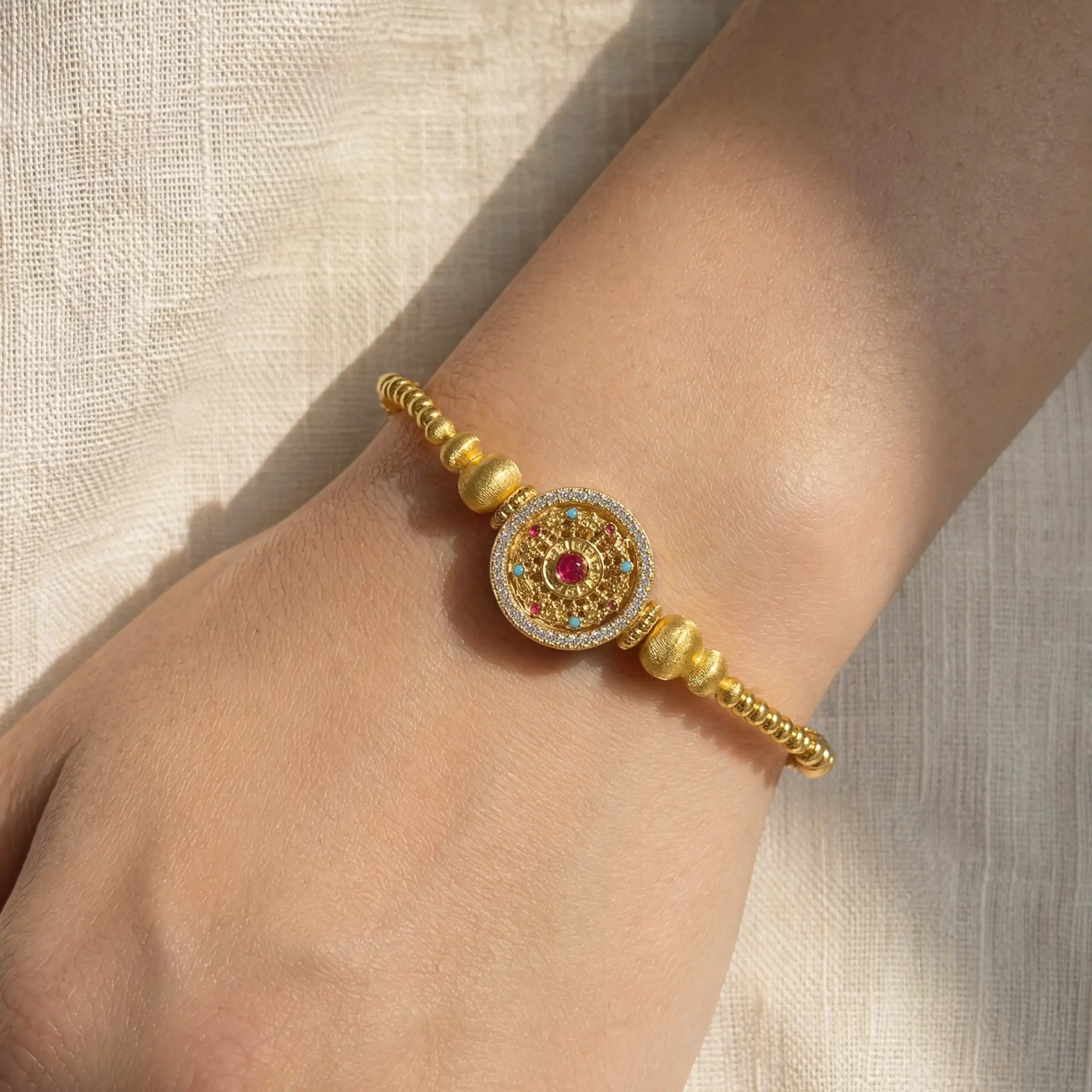 Divine Direction – Rotating Compass & Cat’s Eye Gourd Bracelet