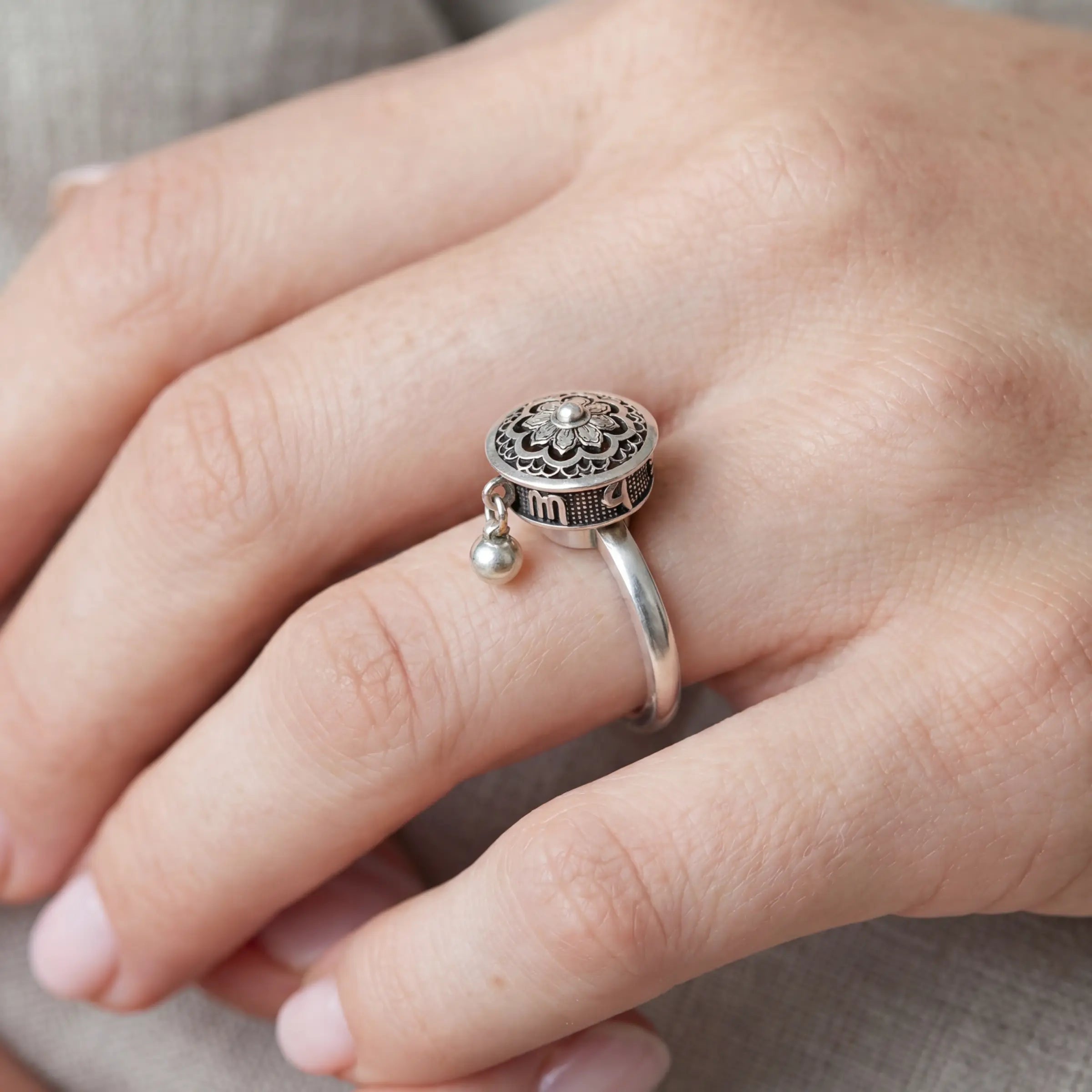 Manifest & Flow – Tibetan Silver Lotus Mantra Spinner Ring