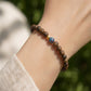 Calm & Purify – Qi Nan Agarwood & Silver Lotus Bracelet