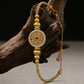 Divine Direction – Rotating Compass & Cat’s Eye Gourd Bracelet