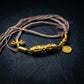 Wealth Blessing – Golden Dzi Bead & Yellow Jambhala Braided Necklace
