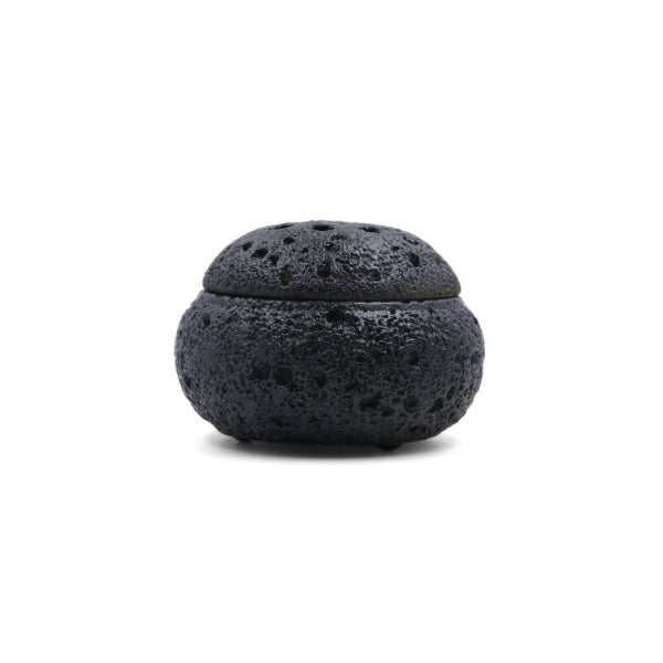 Balance & Clarity Feng Shui Lunar Incense Burner, black round incense holder with moon-like textured porous surface, spiritual home decor for meditation and balance on a clean white background.