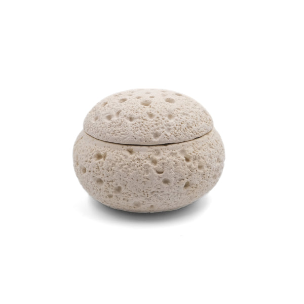 Balance & Clarity Feng Shui Lunar Incense Burner, round incense holder with light porous moon-textured surface and lid, spiritual home decor for meditation and balance on a clean white background.