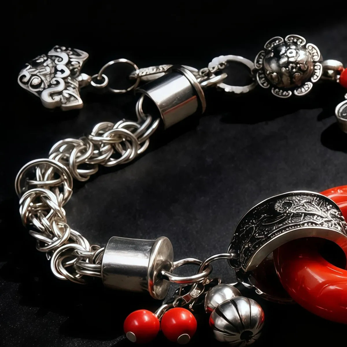 Close-up Tibetan Silver bracelet with various charms on a dark background