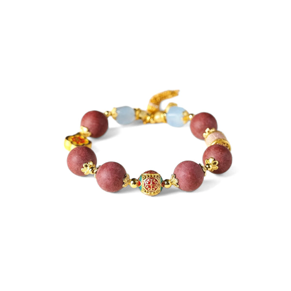A Tibetan Five Elements Aromatherapy Bracelet, meticulously handcrafted. It features deep - red incense beads interspersed with light - blue beads, complemented by elegant gold - toned accents. Among them, a particularly eye - catching bead is adorned with colorful traditional patterns. This bracelet is thought to bring blessings, cleanse energy, and restore inner balance, embodying ancient Tibetan craftsmanship. 