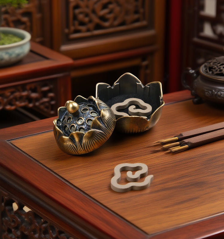 Feng Shui Lotus Incense Burner in bronze lotus design, displayed with open lid and incense chips placed inside, symbolizing energy clearing, balance, and inner peace.