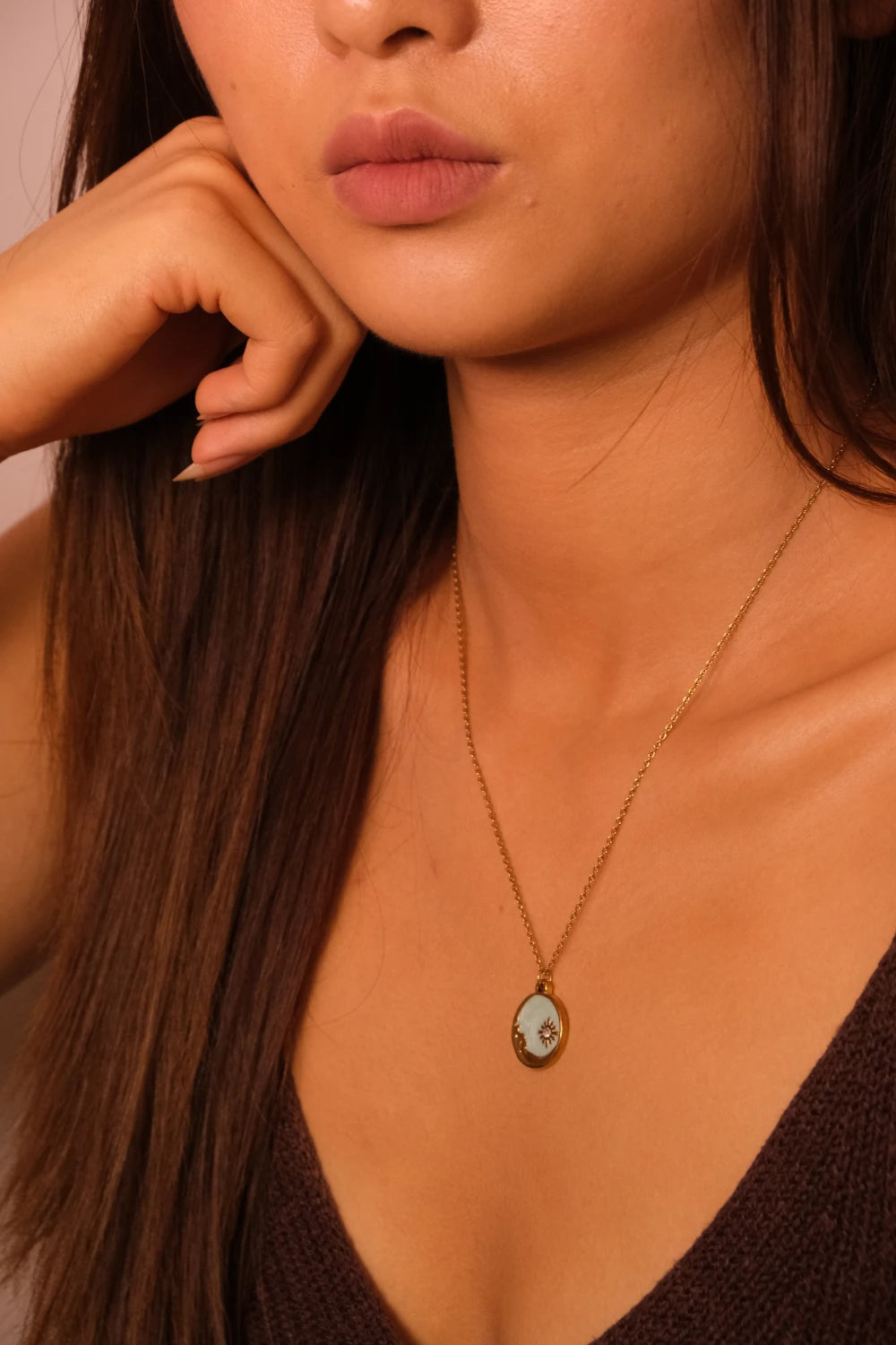 Close-up of a woman wearing Blessings & Clarity Shoushan Stone Good Luck Necklace， with a pendant.