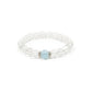 A Natural Clear Quartz & Aquamarine Bracelet. This bracelet is primarily composed of clear quartz beads, which have a translucent, glass - like appearance. At the center, there is a single aquamarine bead, showcasing a delicate light blue hue. Flanking the aquamarine bead are small, intricately designed silver - toned accents.