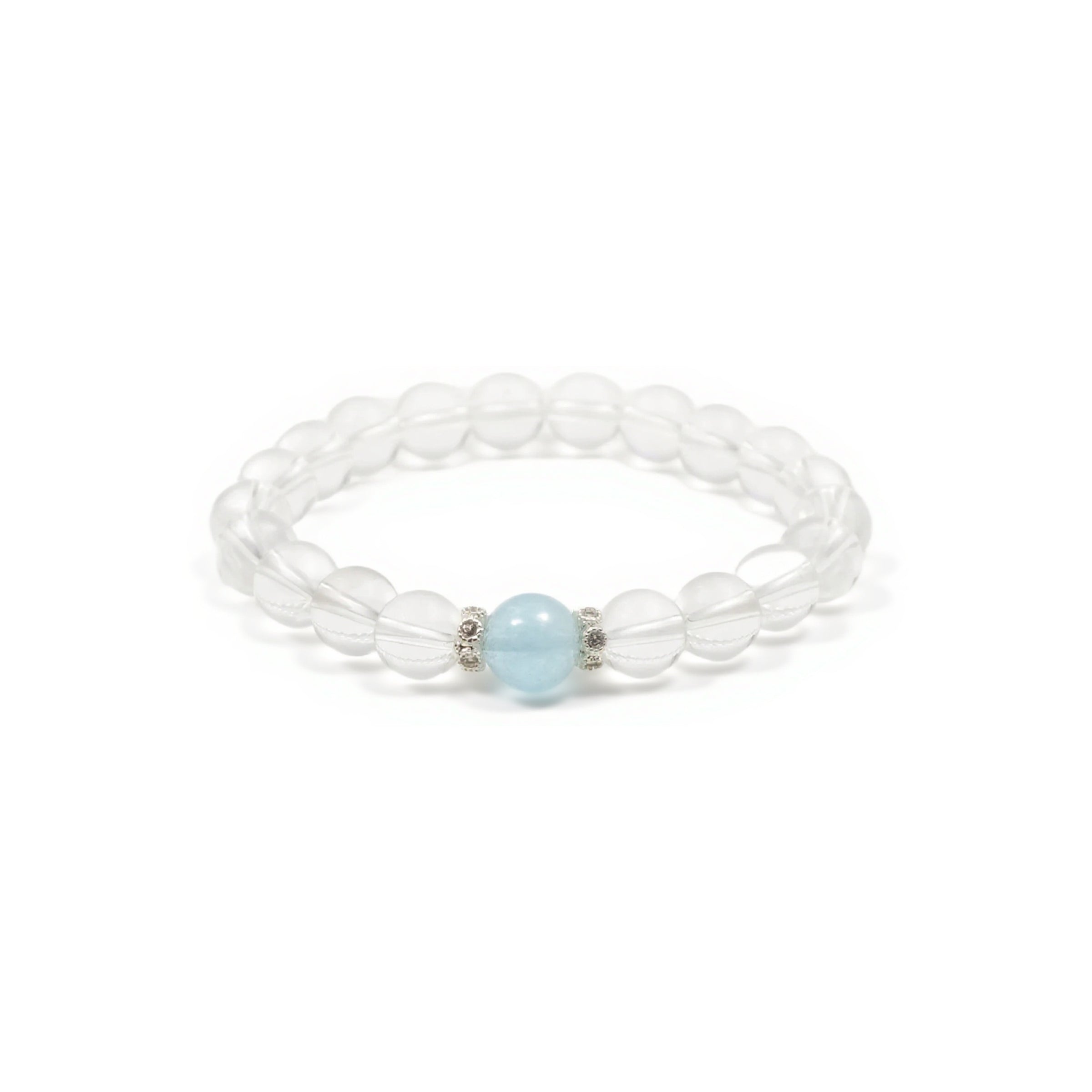 A Natural Clear Quartz & Aquamarine Bracelet. This bracelet is primarily composed of clear quartz beads, which have a translucent, glass - like appearance. At the center, there is a single aquamarine bead, showcasing a delicate light blue hue. Flanking the aquamarine bead are small, intricately designed silver - toned accents.