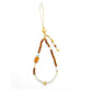 Natural Sandalwood Buddha Phone Strap & Car Charm with gold accents on a white background