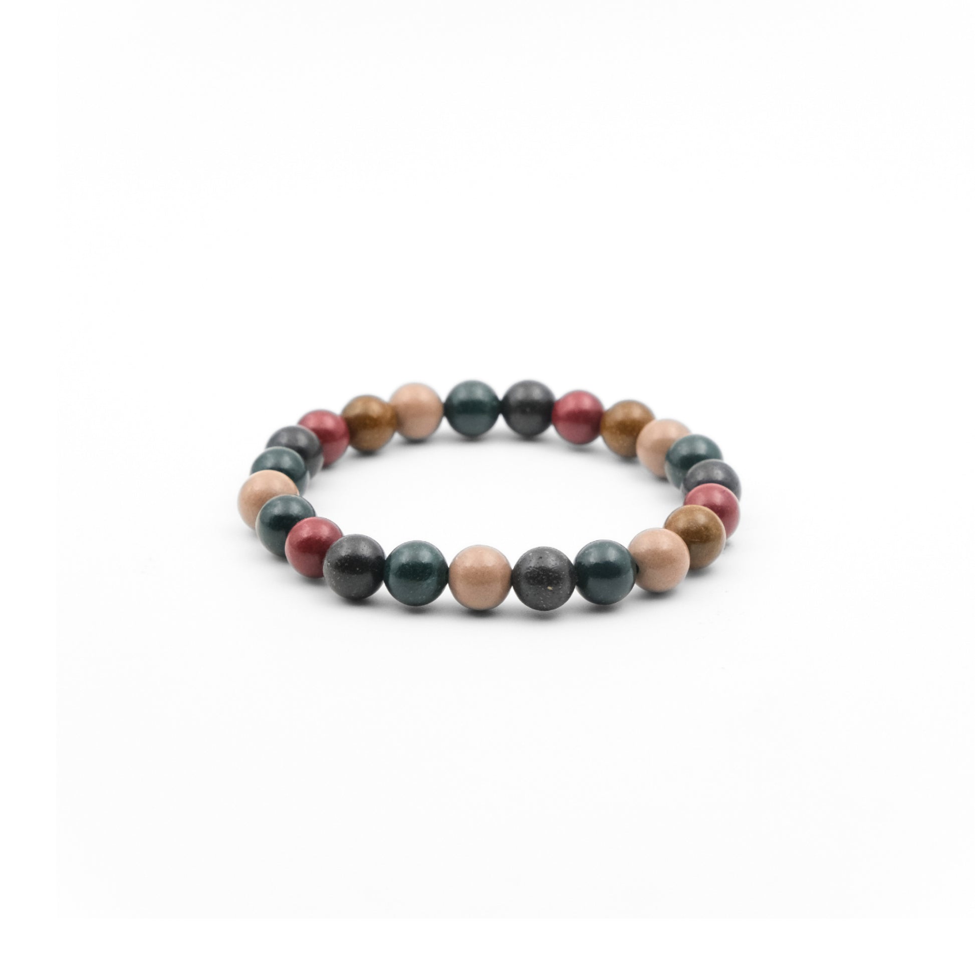 A Nature Five Element Aromatherapy Bracelet featuring an array of natural blended incense beads in various colors, including shades of green, red, brown, and beige. These beads are strung together to form a circular bracelet, believed to promote mindfulness, bring balance, and help focus one's intention. The diverse colors of the beads add a visually appealing and earthy aesthetic to the piece. 