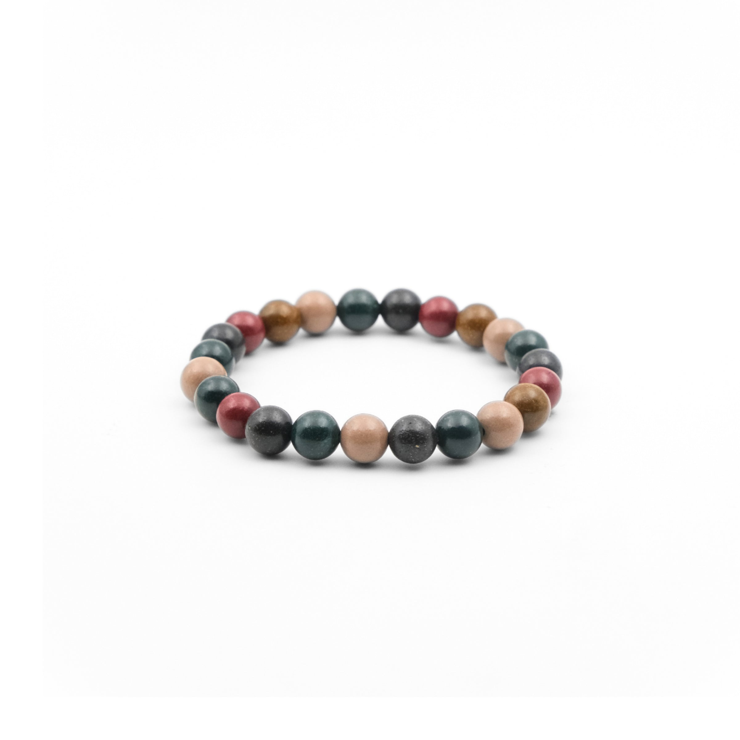 A Nature Five Element Aromatherapy Bracelet featuring an array of natural blended incense beads in various colors, including shades of green, red, brown, and beige. These beads are strung together to form a circular bracelet, believed to promote mindfulness, bring balance, and help focus one's intention. The diverse colors of the beads add a visually appealing and earthy aesthetic to the piece. 