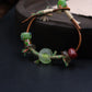 Ancient Liuli Talisman Bracelet for Grounding & Intention on a dark surface