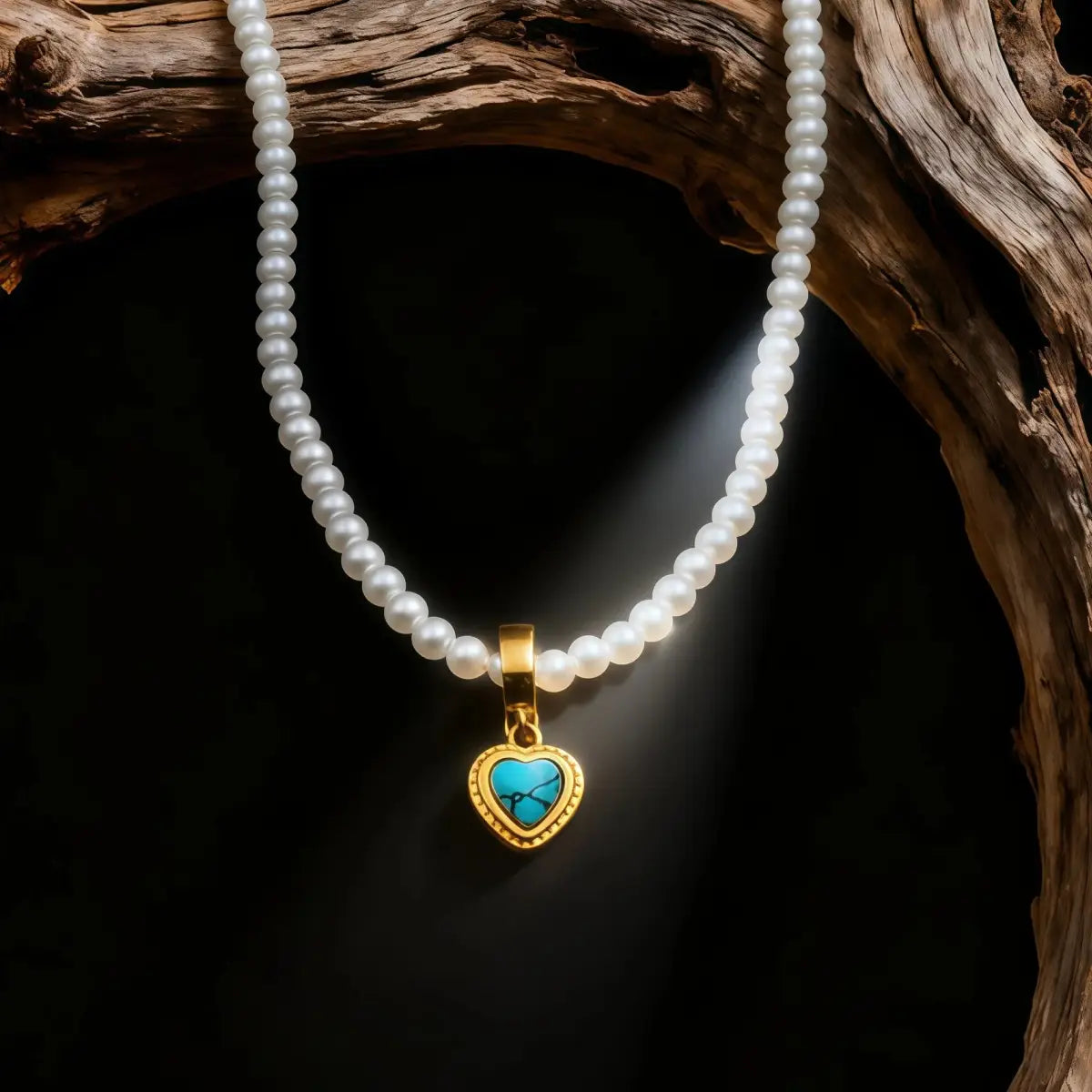 A Tibetan-style seed pearl necklace featuring a gold-rimmed heart-shaped turquoise pendant with natural matrix veins, resting on dark rustic wood to symbolize protection and peace.