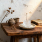 Purity & Awakening Liuli Lotus Incense Holder, Frosted Lotus Design, Displayed with Rustic Teaware, Dried Flowers, and Book for Serene Incense Moments