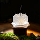 Purity & Awakening Liuli Lotus Incense Holder, Frosted Lotus Design, Displayed with Moss and Stones in Dim Light for Mystical and Tranquil Ambiance