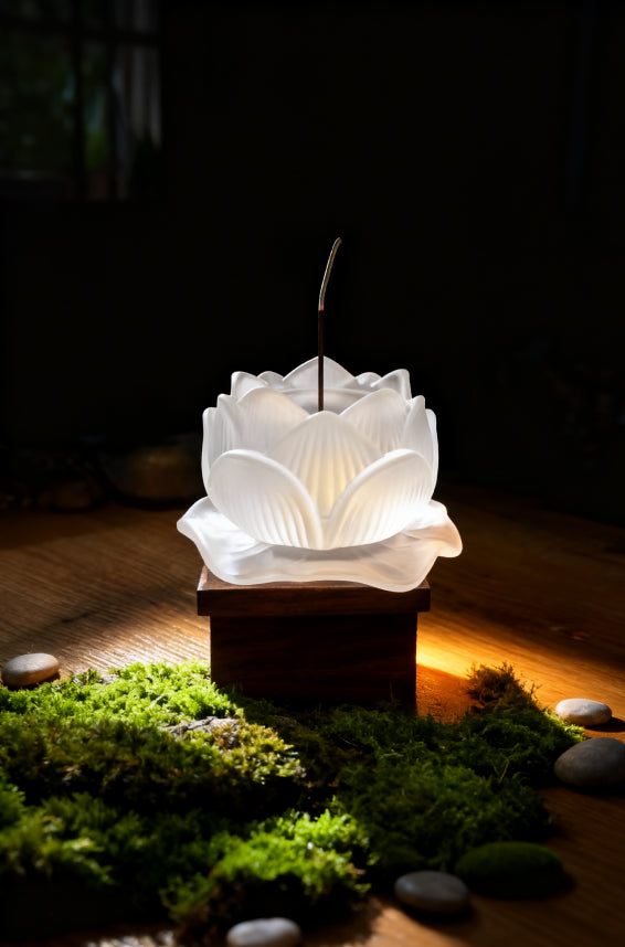 Purity & Awakening Liuli Lotus Incense Holder, Frosted Lotus Design, Displayed with Moss and Stones in Dim Light for Mystical and Tranquil Ambiance