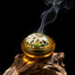 Decorative incense holder with smoke on a dark background