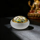 Frosted_White Decorative incense holder with floral design on a dark background, with a tibetan style buddha