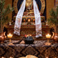 Buddhist altar with statue, incense, and cookies in a ceremonial setting