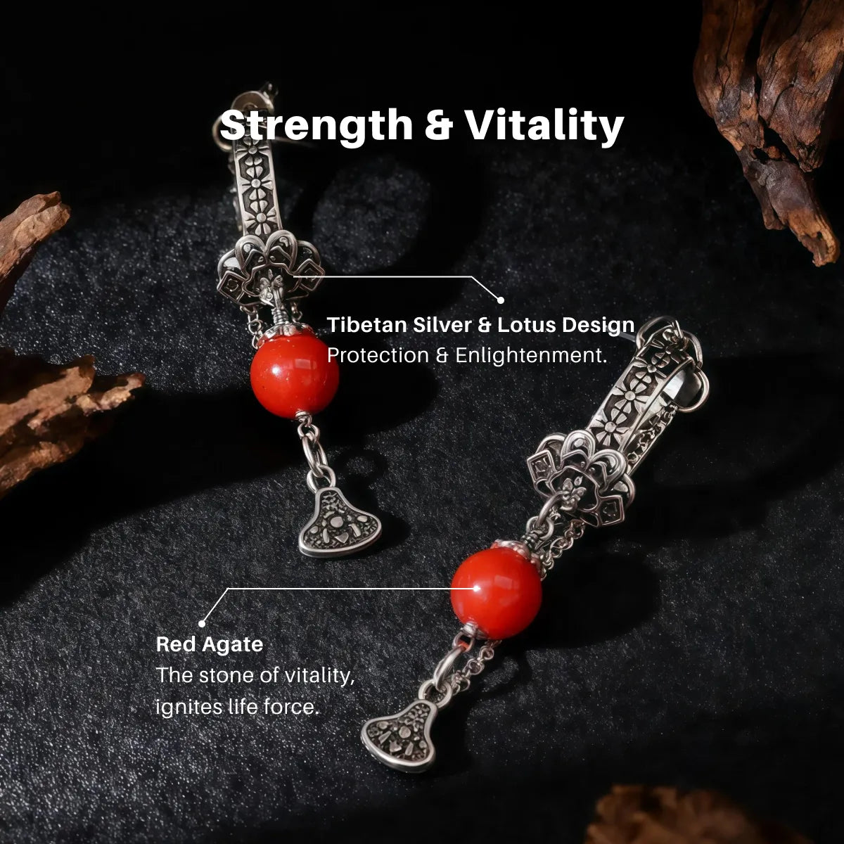 Tibetan silver earrings with red agate stones on a dark background