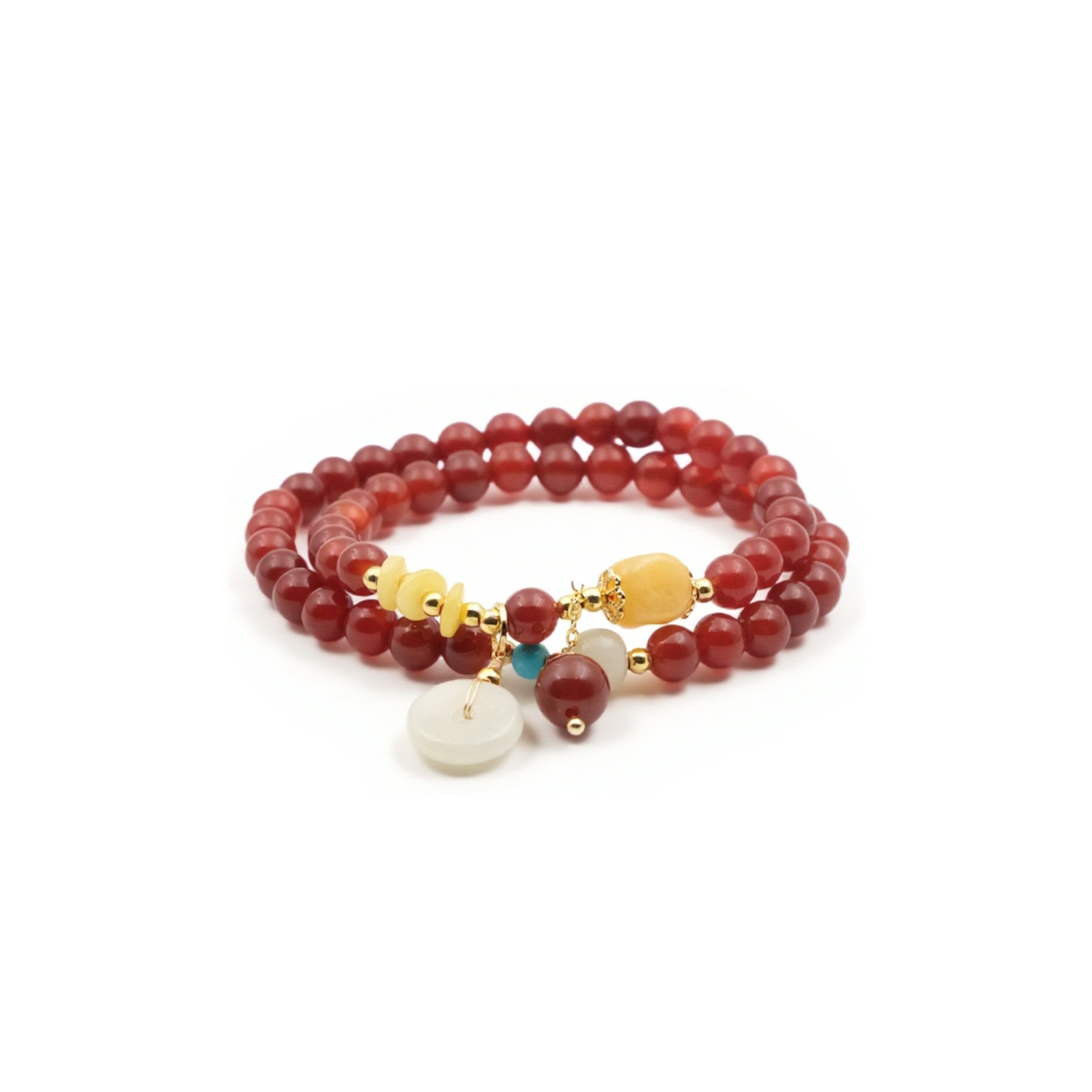 A Tibetan Blessing Bracelet, featuring a double - stranded design. The primary beads are a rich red color, likely red agate. Interspersed among the red beads are smaller yellow, white, and turquoise beads, adding a touch of contrast. A larger white pendant - like bead dangles elegantly from the bracelet, along with a couple of red beads. 