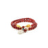 A Tibetan Blessing Bracelet, featuring a double - stranded design. The primary beads are a rich red color, likely red agate. Interspersed among the red beads are smaller yellow, white, and turquoise beads, adding a touch of contrast. A larger white pendant - like bead dangles elegantly from the bracelet, along with a couple of red beads. 