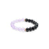An elegant Tibetan Dual Energy Bracelet featuring alternating obsidian black beads and soft - hued amethyst beads, interspersed with small gold - toned accents. This bracelet is believed to offer protection, enhance intuition, and bring inner peace. 