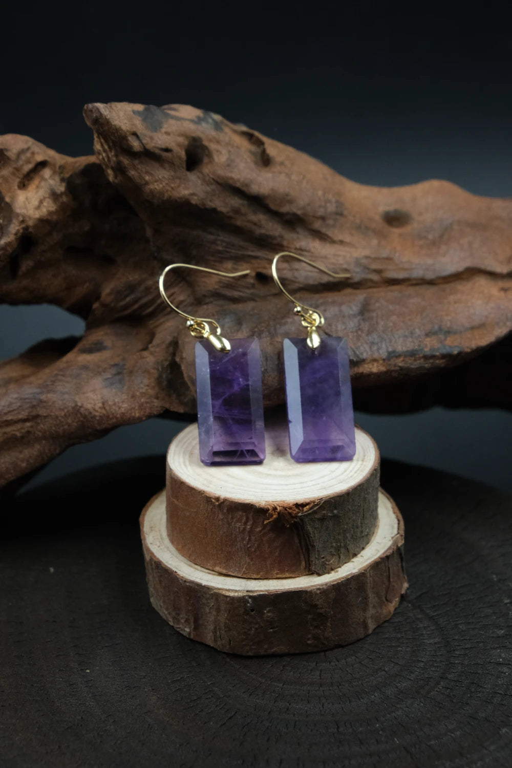 Amethyst earrings on a wooden stand with a dark background, Tibetan Feng Shui Crystal Earrings for Focus, Emotional Balance & Energetic Protection