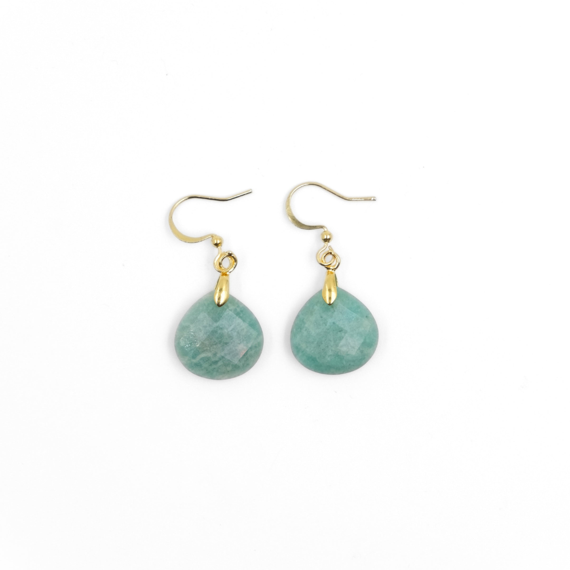 A pair of Tibetan Feng Shui Drop Earrings, each featuring a teardrop - shaped amazonite gemstone. The amazonite exhibits a soothing turquoise - green hue. These gemstones are attached to elegant gold - toned ear hooks. Believed to boost confidence, bring calmness, and symbolize new beginnings,  these earrings blend style with spiritual significance. 