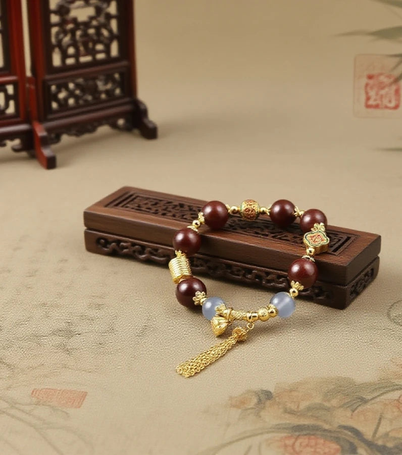 Tibetan Five Elements Aromatherapy Bracelet with beads and gold accents on a dark background,Cleansing Inner Balance