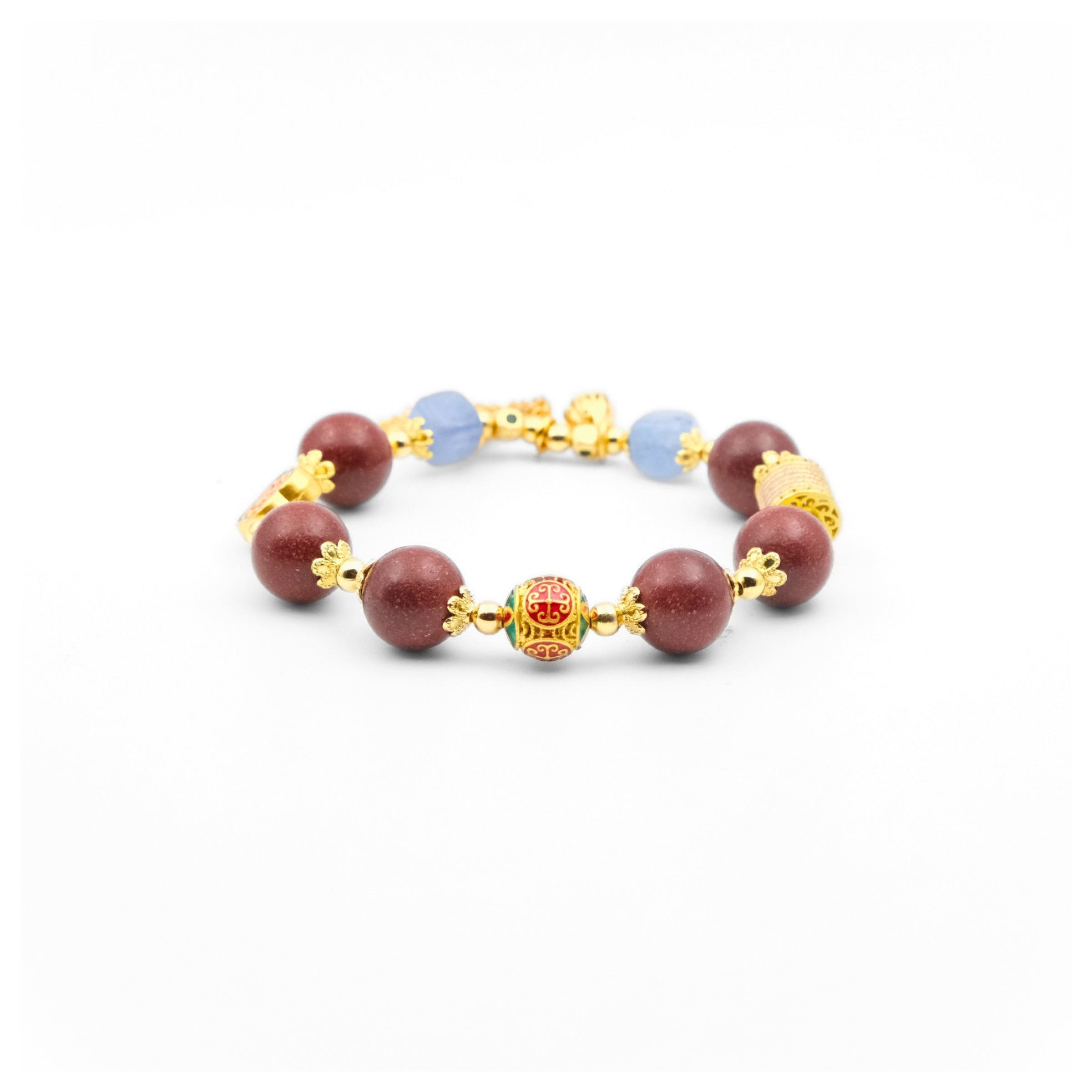 A Tibetan Five Elements Aromatherapy Bracelet, meticulously handcrafted. It features deep - red incense beads interspersed with light - blue beads, complemented by elegant gold - toned accents. Among them, a particularly eye - catching bead is adorned with colorful traditional patterns. This bracelet is thought to bring blessings, cleanse energy, and restore inner balance, embodying ancient Tibetan craftsmanship. 