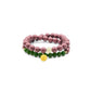 A double - stranded Tibetan Five Elements Aromatherapy Bracelet. The upper strand is composed of soft pinkish - purple natural incense beads, while the lower strand features vibrant green chalcedony beads. A golden lotus charm dangles elegantly from the green chalcedony strand, and a single light - colored bead adds a touch of contrast to the upper strand. This bracelet is believed to offer protection, bring clarity, and help with wish fulfillment. 