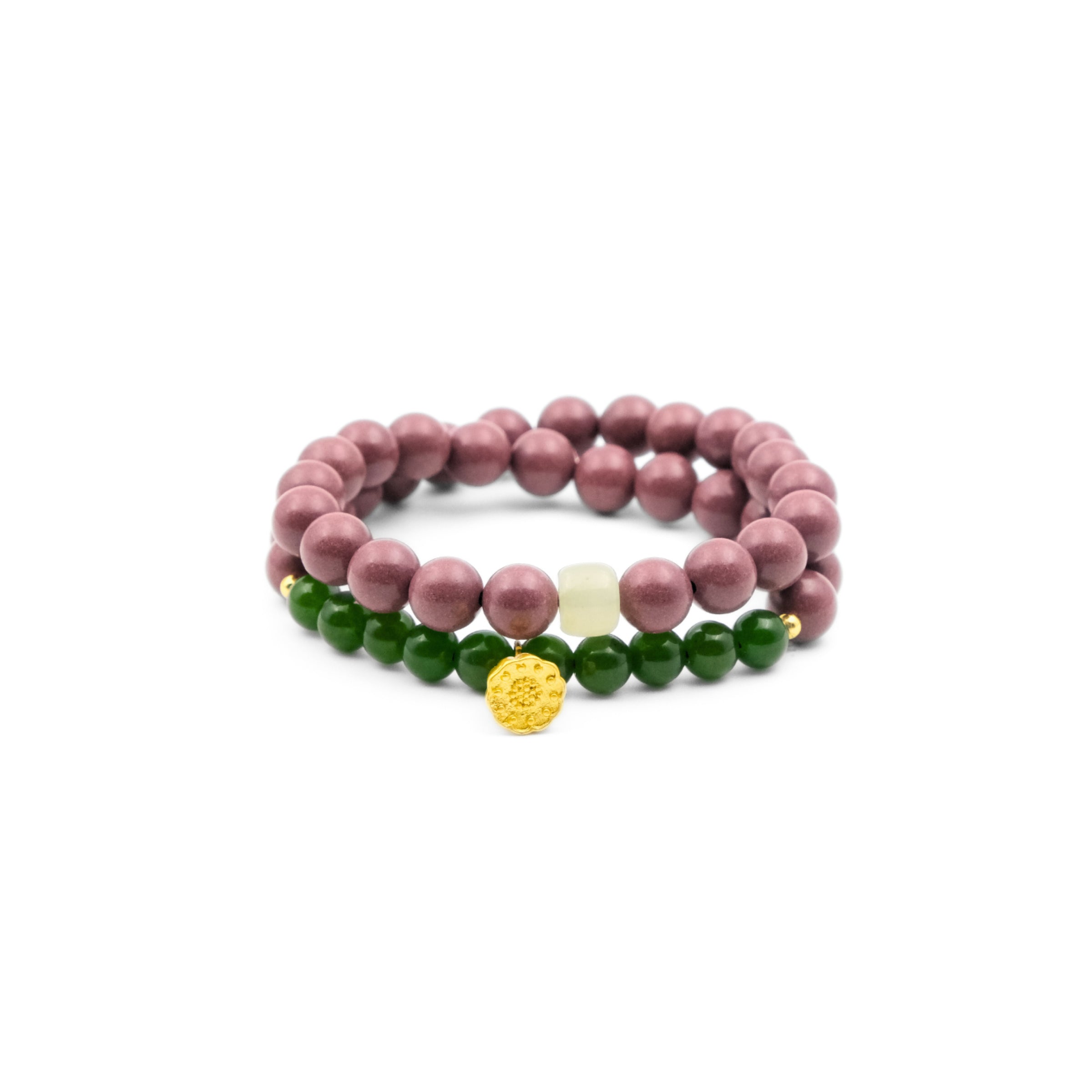 A double - stranded Tibetan Five Elements Aromatherapy Bracelet. The upper strand is composed of soft pinkish - purple natural incense beads, while the lower strand features vibrant green chalcedony beads. A golden lotus charm dangles elegantly from the green chalcedony strand, and a single light - colored bead adds a touch of contrast to the upper strand. This bracelet is believed to offer protection, bring clarity, and help with wish fulfillment. 