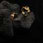 Tibetan Five Elements Ring – Tiger’s Eye for Success & Abundance on a dark textured surface
