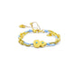 A Tibetan Harmony Double Bracelet featuring a golden gourd charm adorned with turquoise accents, strung with blue cord and golden beads, symbolizing luck and protection.