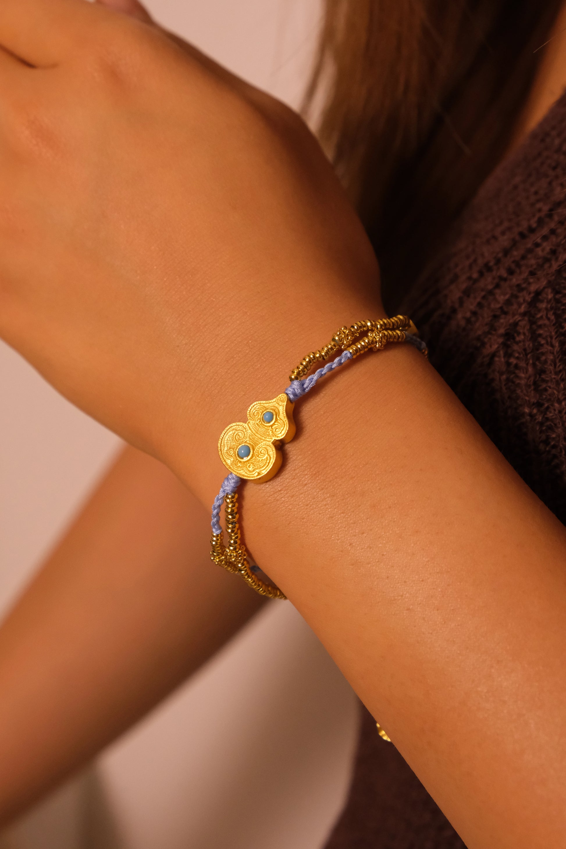 Gourd & Turquoise Tibetan Harmony Double Bracelet for Luck & Protection on a wrist.