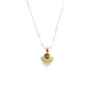 A Tibetan Radiance Pendant Necklace featuring a sun - shaped design. At its center is a tiger's eye stone, set in a golden - toned metal with a radiant, spiked pattern around it. The necklace has a delicate chain with small golden beads. This piece is believed to bring success and abundance.