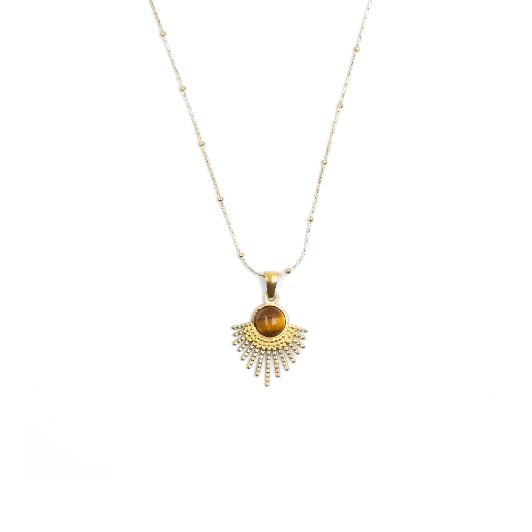 A Tibetan Radiance Pendant Necklace featuring a sun - shaped design. At its center is a tiger's eye stone, set in a golden - toned metal with a radiant, spiked pattern around it. The necklace has a delicate chain with small golden beads. This piece is believed to bring success and abundance.