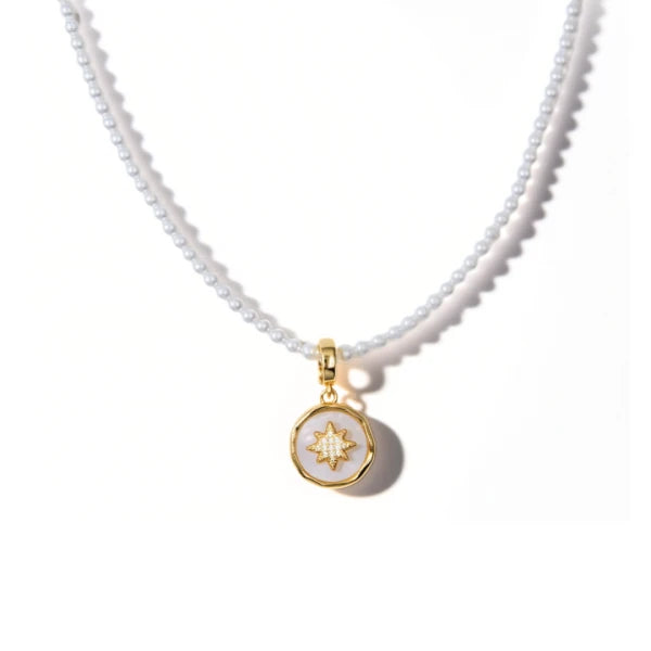 Necklace with a gold pendant on a white background