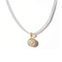 Necklace with a gold pendant on a white background