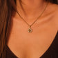 Tibetan Pendant Necklace with a sunflower pendant worn by a person