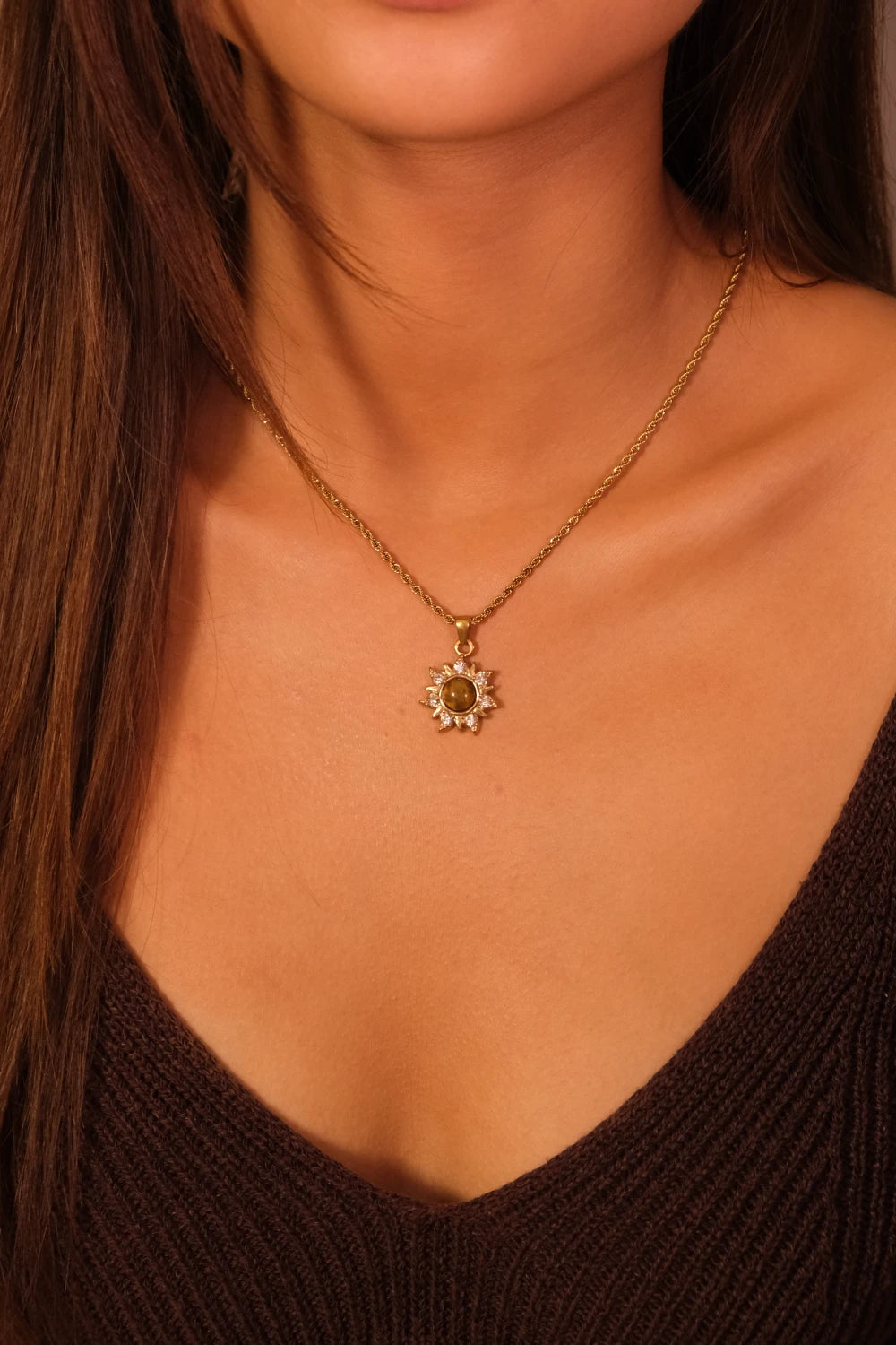 Tibetan Pendant Necklace with a sunflower pendant worn by a person