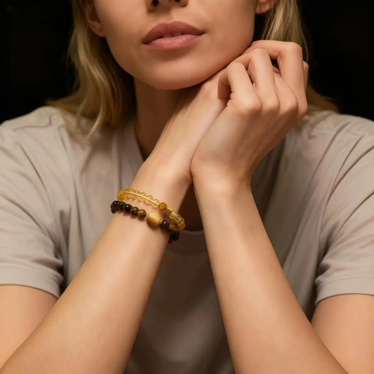 Woman wearing the Golden Glow Tiger’s Eye bracelet, highlighting its elegant fit and natural golden shine on the wrist.