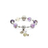 A Vajra Bell Crystal Energy Bracelet featuring amethyst beads that display a beautiful range of purple hues. These amethyst beads are interspersed with other beads, including a light - colored one and an intricately designed silver bead. Silver - toned floral - like accents accompany the beads.