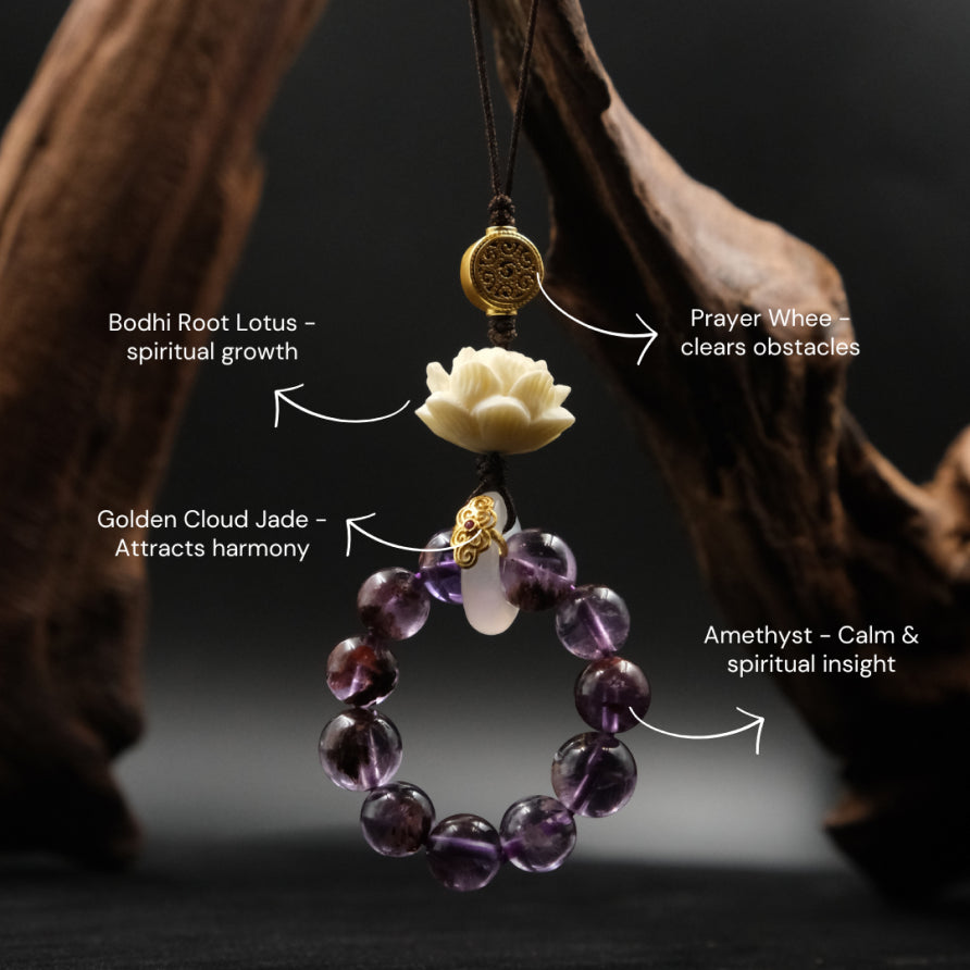 Bodhi Root for Mindfulness & Protection, Amethyst beaded necklace with gold accents and a white flower pendant on a dark background