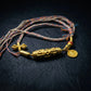 Wealth Blessing – Golden Dzi Bead & Yellow Jambhala Braided Necklace